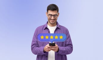 A man standing up looking down at his phone. 5 stars overlay to represent a positive customer experience (CX).